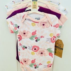 Pack of 4 new baby girl doll onesies!